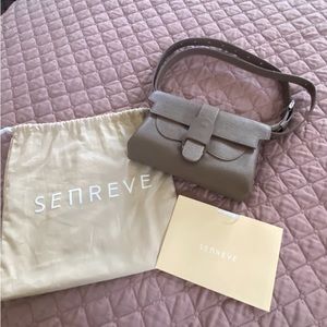 NWT Senreve Aria Belt Bag in mimosa leather. Color Mocha with silver (sold out).